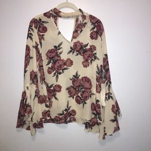 Floral trumpet sleeve blouse.